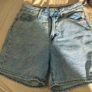 Blue jorts one ripped belt loop